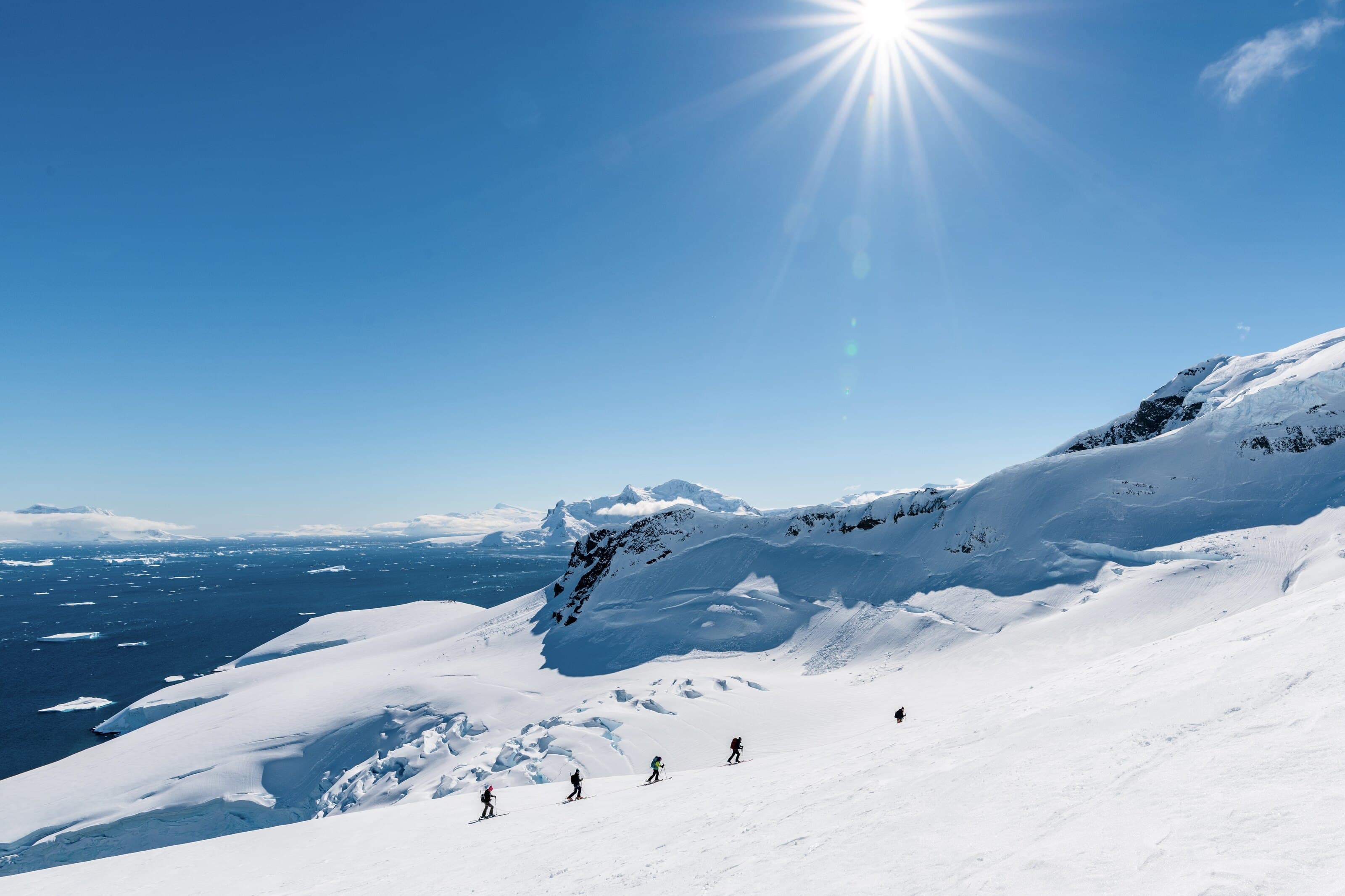 Skiers on an Antarctic skin track